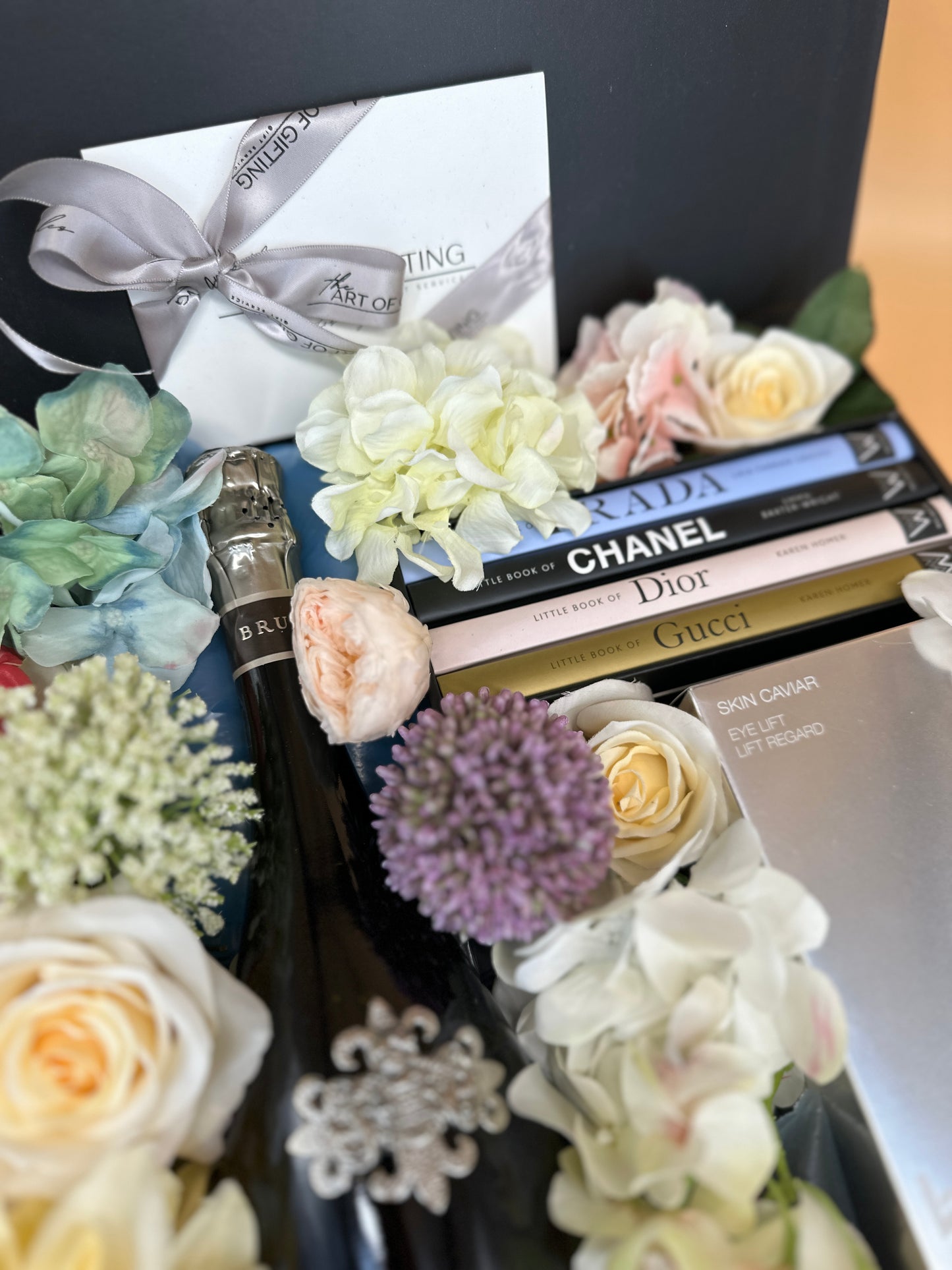 Gift with flowers and PRADA CHANEL DIOR GUCCI books