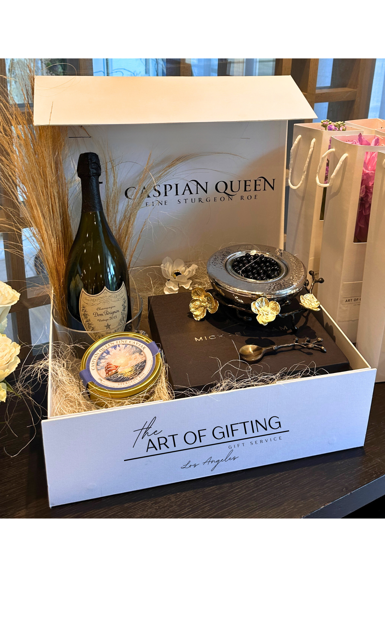 Gift set with Caspian Queen caviar and Michael Aram caviar dish in the white box.