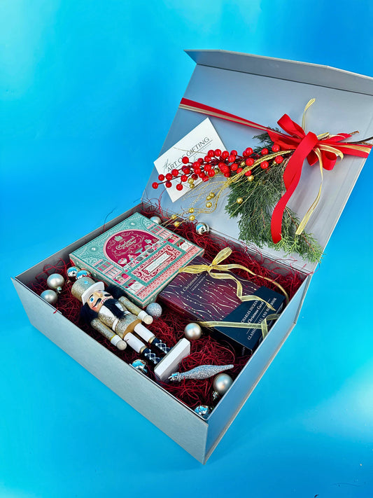 Christmas gift with nutcracker and Charles Dickens book gift set