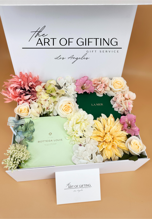 Gift with flowers La Mer cosmetic and Bottega Louie cake