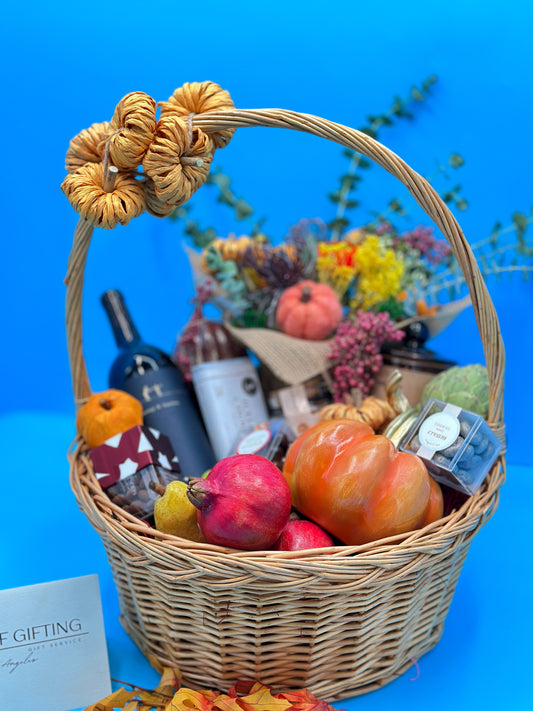 Thanksgiving gift basket with fall flowers